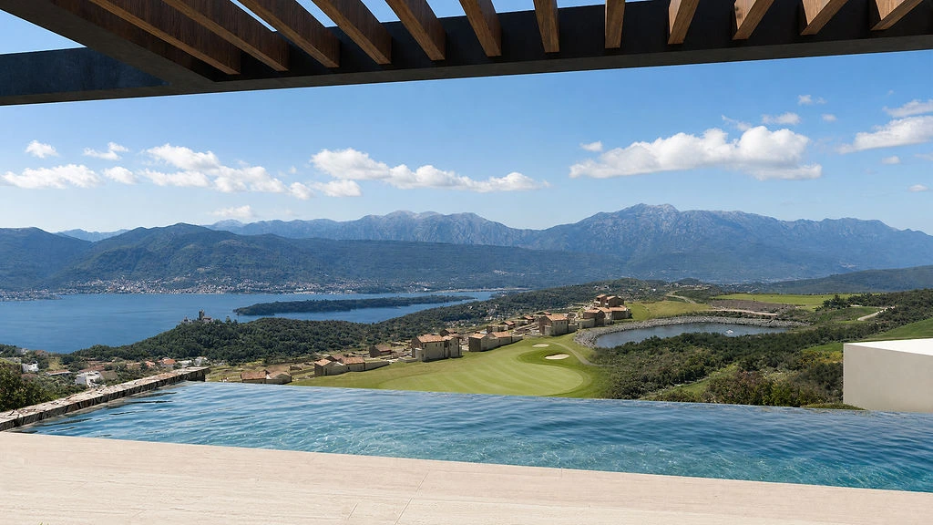 View from a SAOTA Twin Villa pool terrace across the fairway towards Boka Bay
